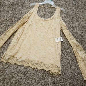 Cream and gold lace long sleeve shirt.